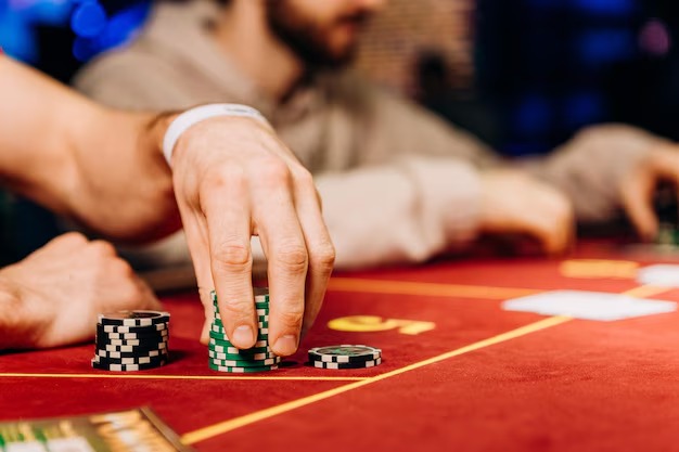 r777 live roulette wheel with ball, betting table, and dealer